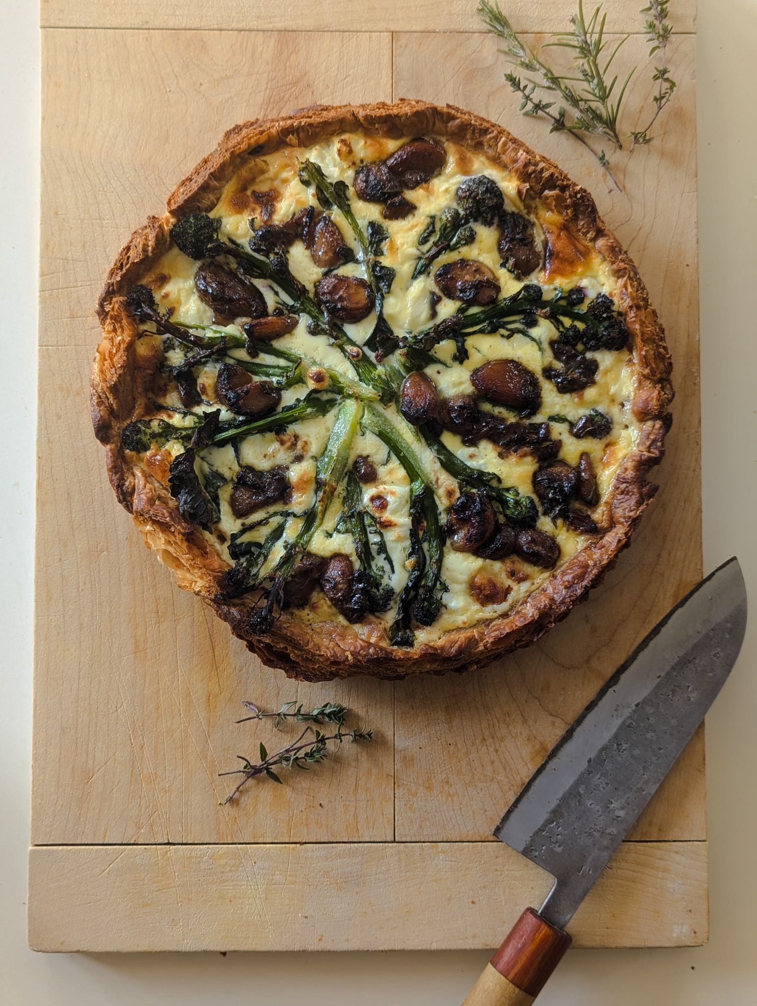 Image of Purple Sprouting Broccoli & Caramelised Garlic Tart